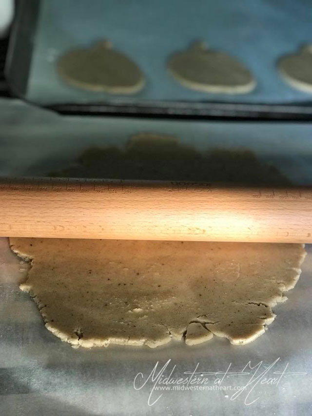 Rolling out fall spiced sugar cookie dough